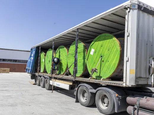 Loading drums into a lorry